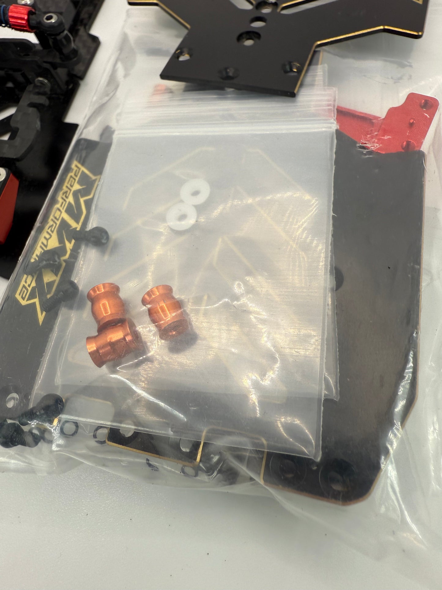 Price Drop! MWX 102mm pre owned chassis V1 with all upgrade parts for V2 conversion, brass chassis